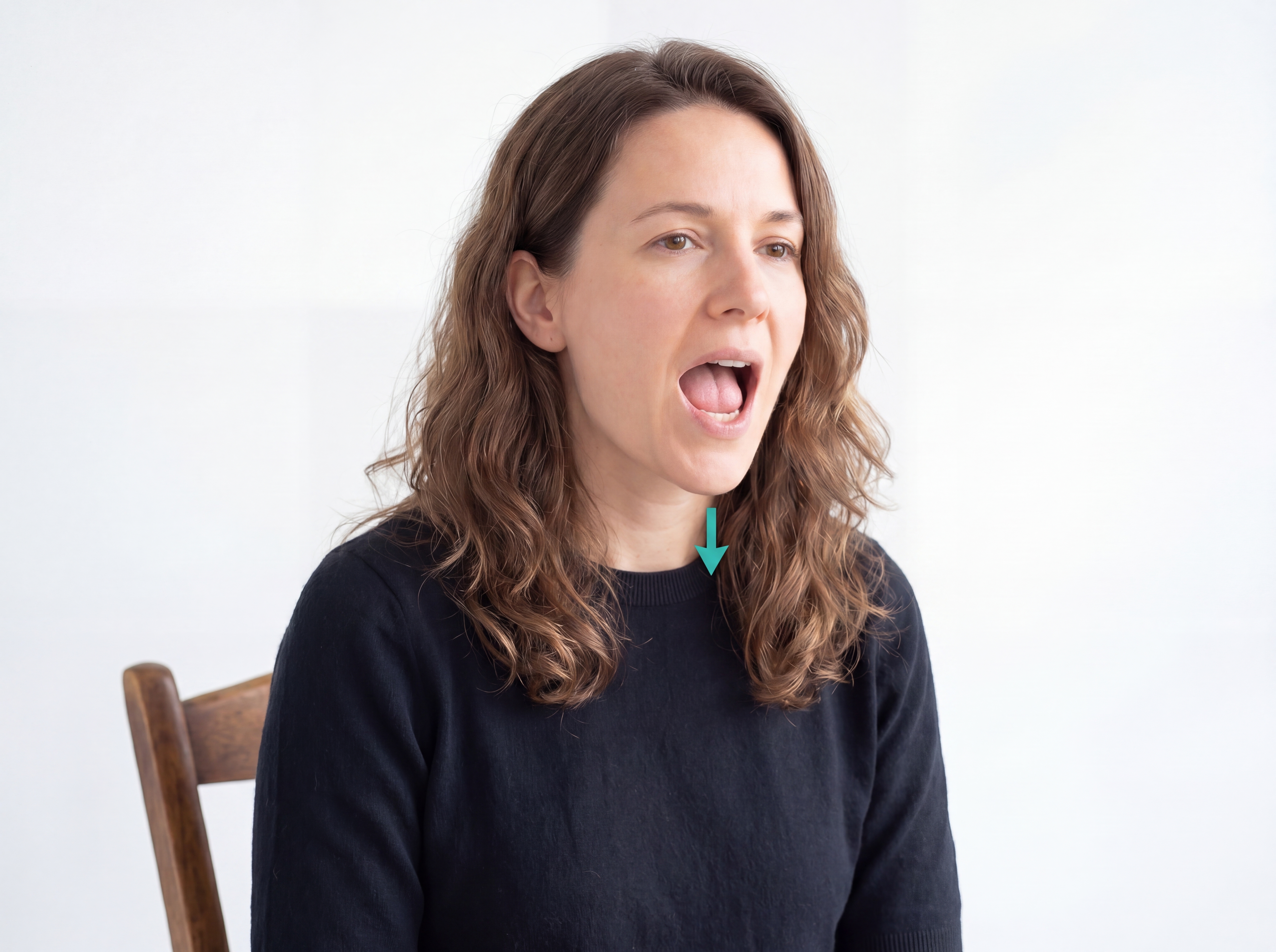Mouth open with tongue still pressed to roof